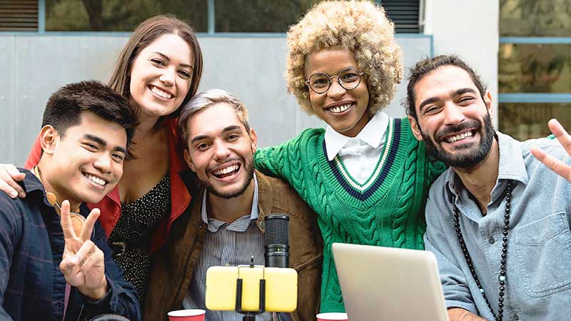 A happy group of people who are financially literate