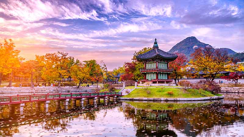 Sunset at the water pavilion in the Gyeongbokgung palace of the land in Seoul, South Korea.